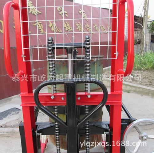 可定制350公斤手动液压堆高车 油桶升高装卸与旋转搬运的高效解决方案